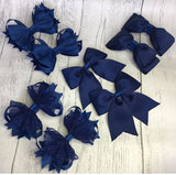 School hair bows in selection of different colours