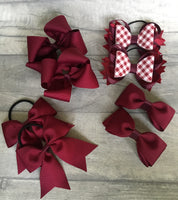 School hair bows in selection of different colours