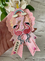 Pink flamingo age and name birthday rosette