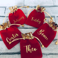 Red and gold personalised named velvet pouches